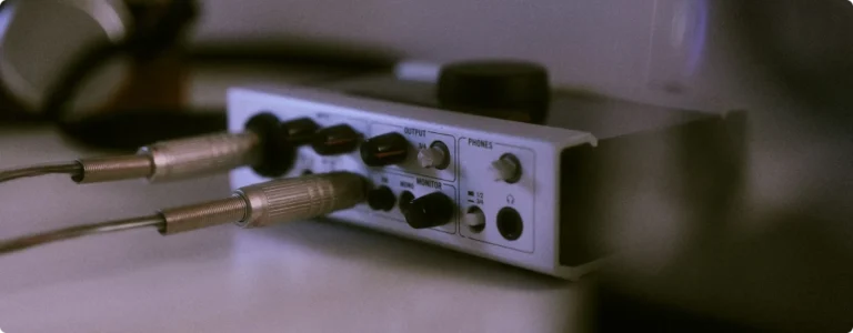 Best Audio Interface Under $100 Top 5 Best Budget Choices Audio interface with cables connected on a desk