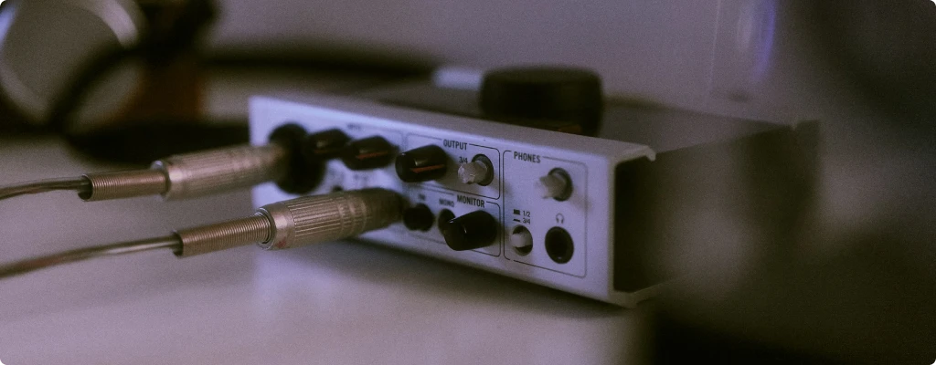 Best Audio Interface Under $100 Top 5 Best Budget Choices Audio interface with cables connected on a desk