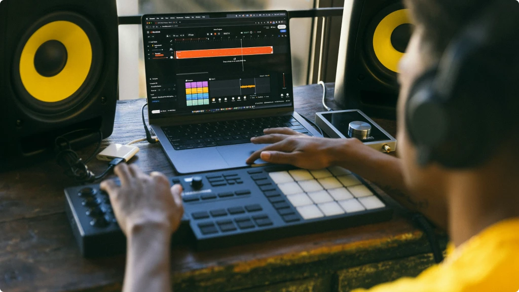 Man manipulating audio equipment, audio interface vs mixer