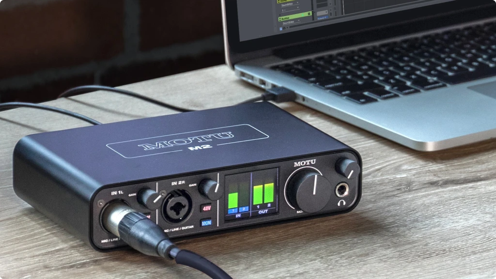 MOTU M2 Review - MOTU M2 USB audio interface sitting on a desk.