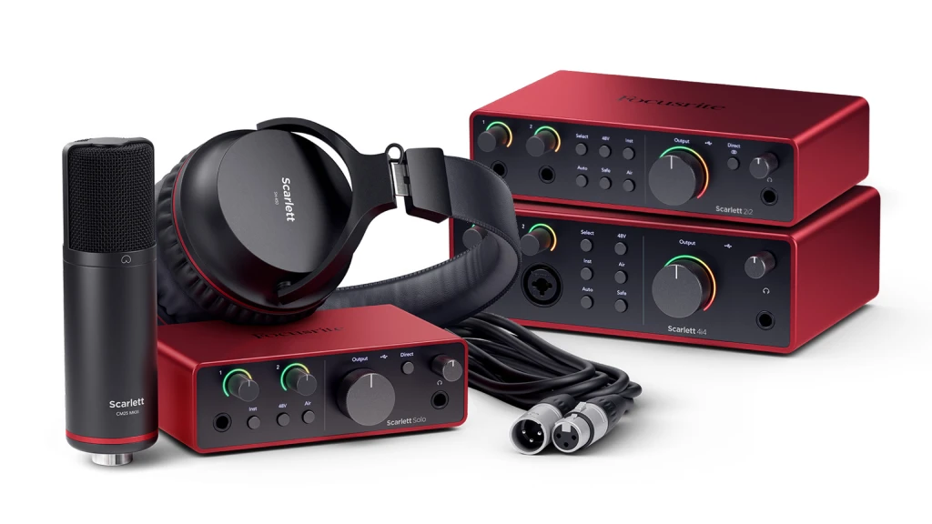 Focusrite Scarlet 4th gen bungle, 3 audio interfaces, microphone and headphones on a light background
